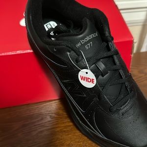 Brand new. Black NB leather walking shoes. Size 9.5 WW